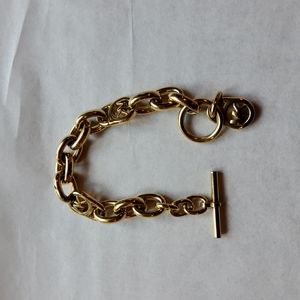 Michael Kors Fulton Logo Gold-tone Padlock and toggle closure bracelet